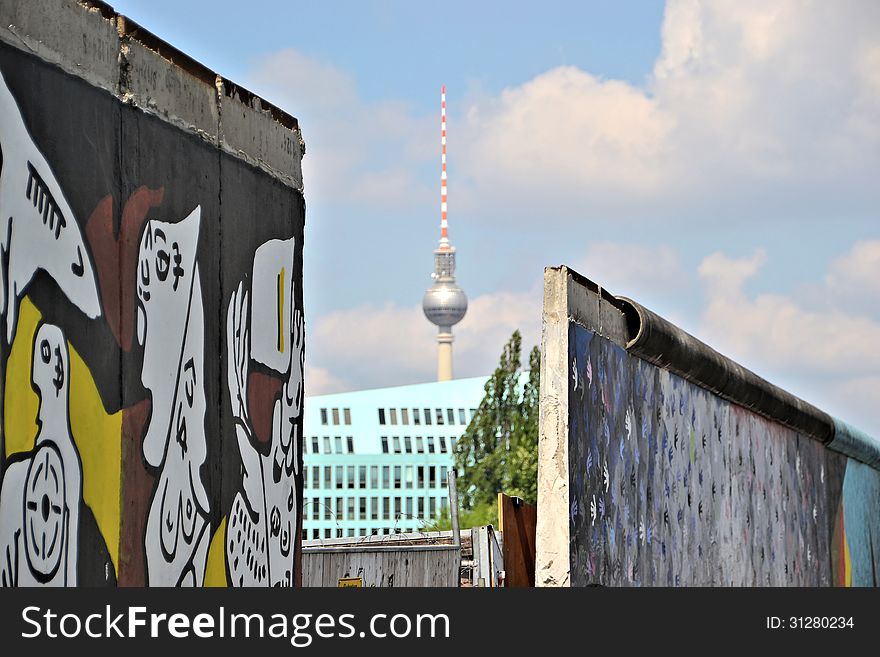 View of the TV tower through a gap in the Berlin Wall