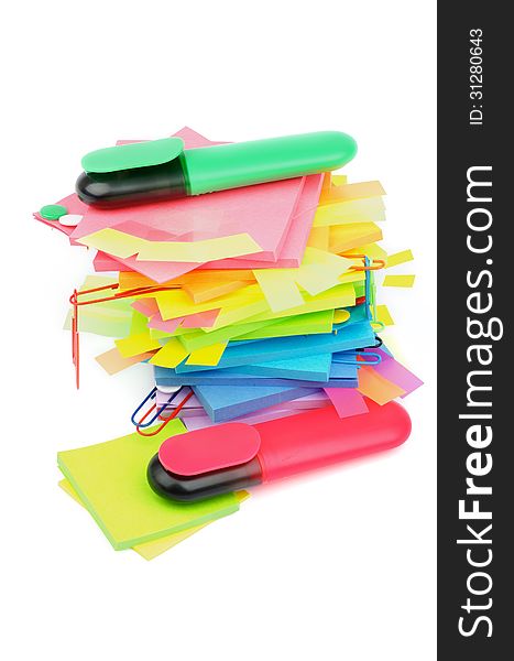 Stack of Adhesive Notes, Paper Clip, Sticky, Fastener, Clips and Felt Tip Pens isolated on white background