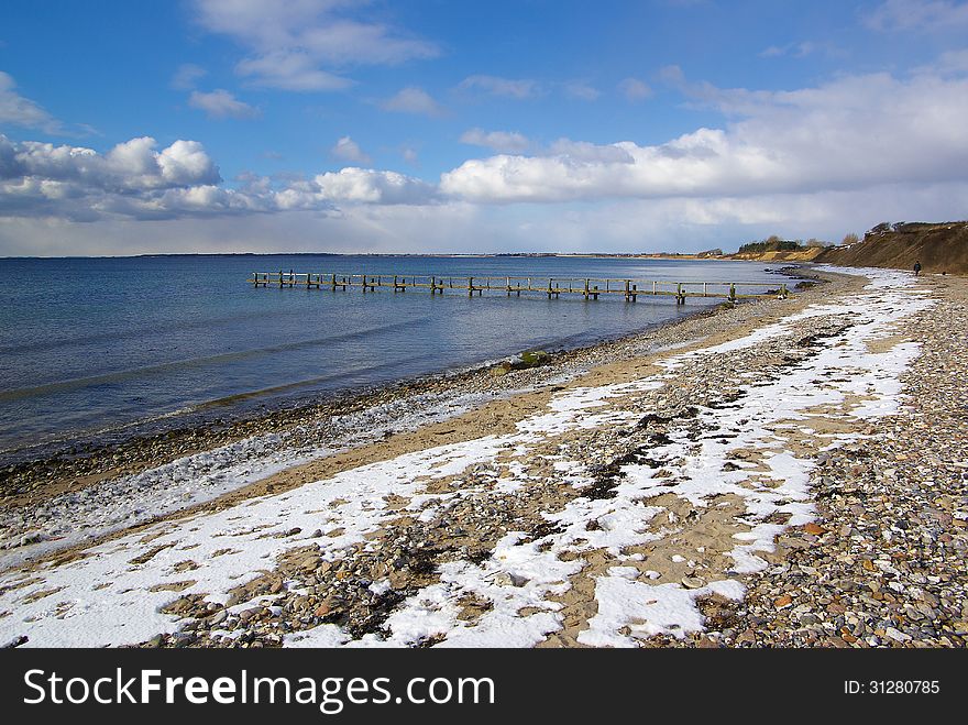 Beautiful winter nature seascape with snow covered seaside