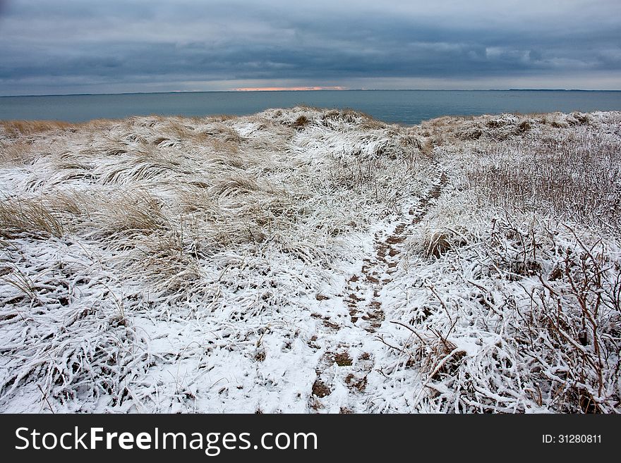 Beautiful winter nature seascape with snow covered seaside