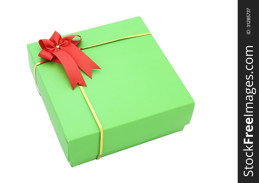 Green gift box with red ribbon bow isolated on white with clipping path