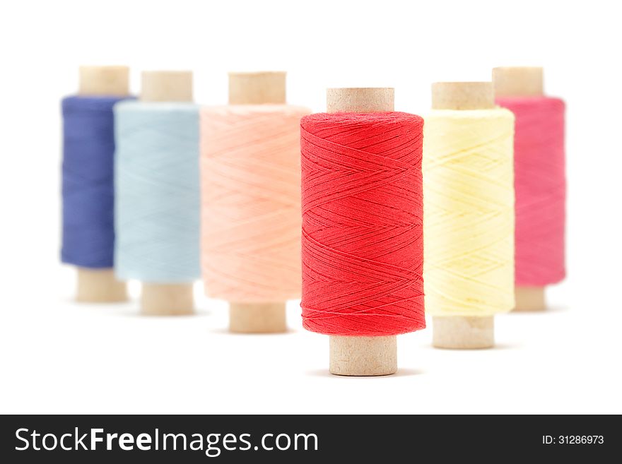 Sewing thread on a white background