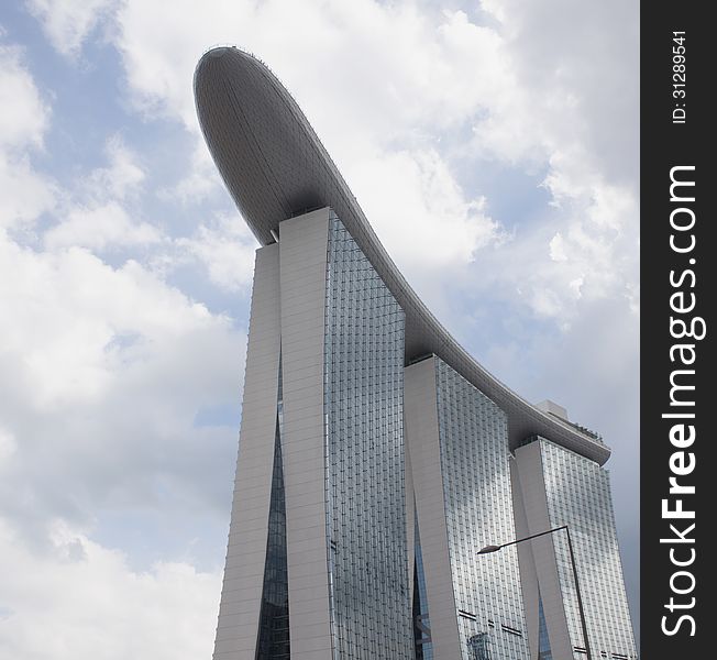 Marina Bay Sands against cloudy sky from bottom view. Singapore