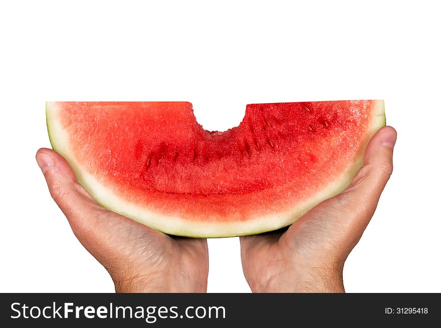 Great shot of hands holding a big slice of watermelon with a big bite out of it. Horizontal shot, isolated on a white background. Great shot of hands holding a big slice of watermelon with a big bite out of it. Horizontal shot, isolated on a white background.