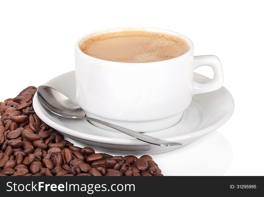 Cup of coffee with coffee beans on white