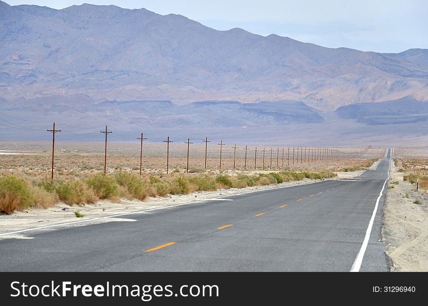 Long road in California, USA. Long road in California, USA.