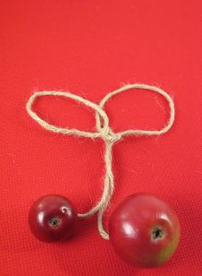 Red Apple And String On Red Ti Royalty Free Stock Images Red Apple And String On Red Ti Royalty Free Stock Images