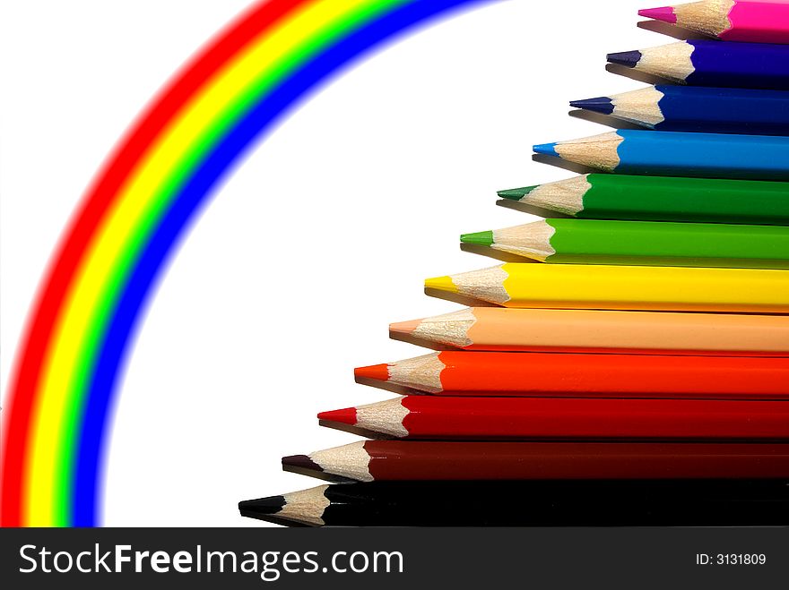 Set of crayons and rainbow isolated