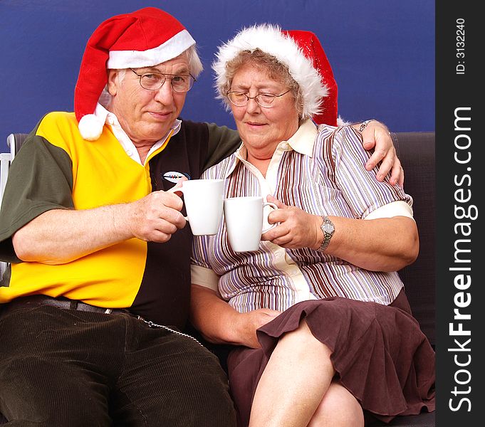 Having a coffee at christmas elderly couple. Having a coffee at christmas elderly couple