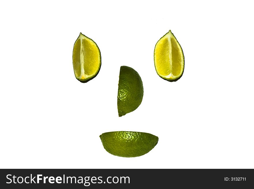 Clown's face made from cut lime wedges. Clown's face made from cut lime wedges