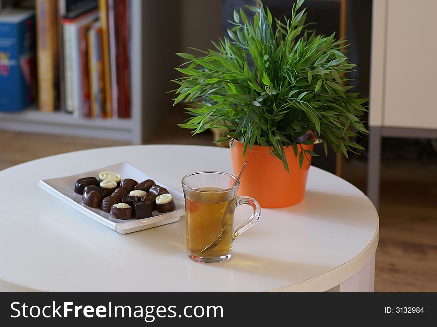 Cup of tea with some chocolates. Cup of tea with some chocolates.