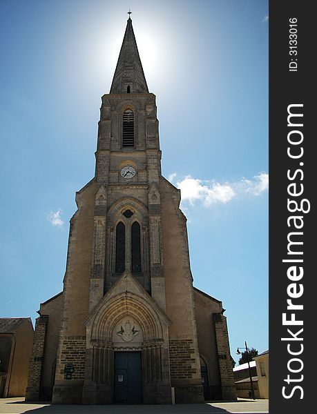 A front side of a gothic church in france