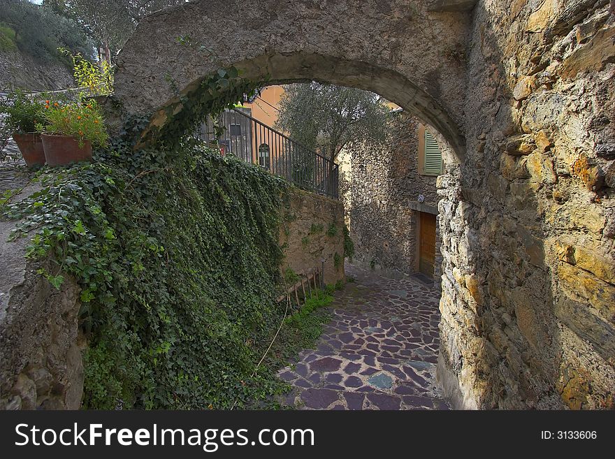 Narrow street in ancient mountain settlement. Narrow street in ancient mountain settlement