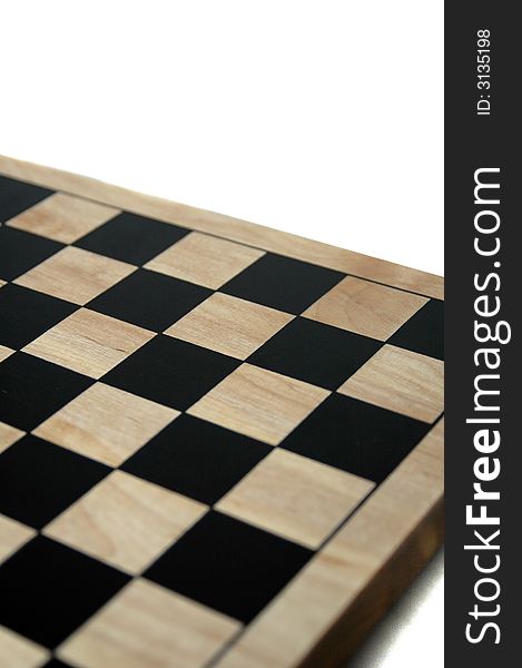 An image of a wooden chess/checkers board isolated on a white background. An image of a wooden chess/checkers board isolated on a white background.