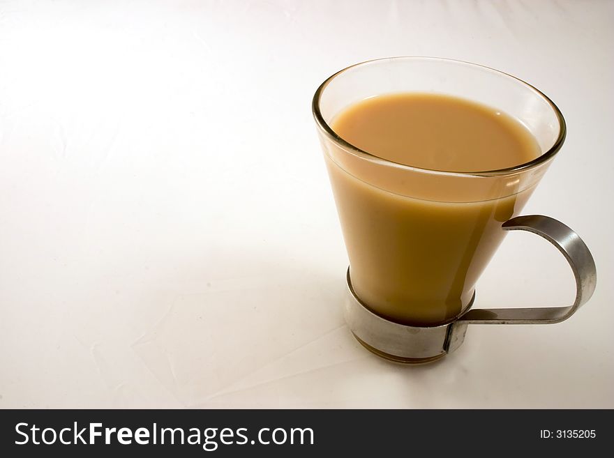 A cup of tea in a cafe style glass cup