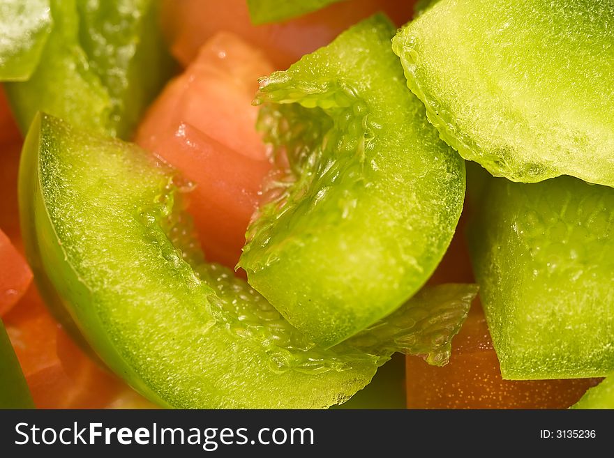 Close up of red and green cut bell peppers. Close up of red and green cut bell peppers