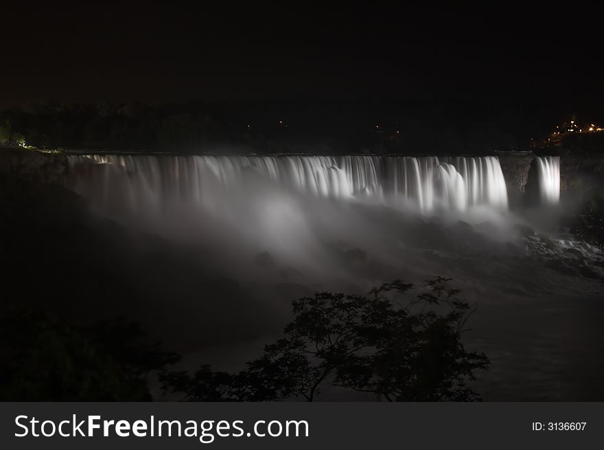 Night-time image of the American Falls, Niagara with the falls in frosty white.