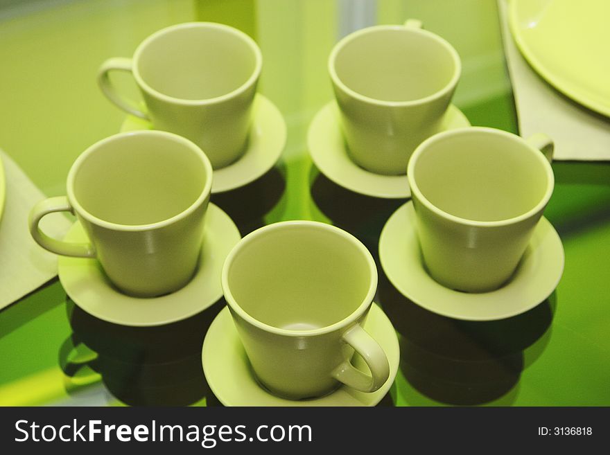 Tea cup and salver in green color