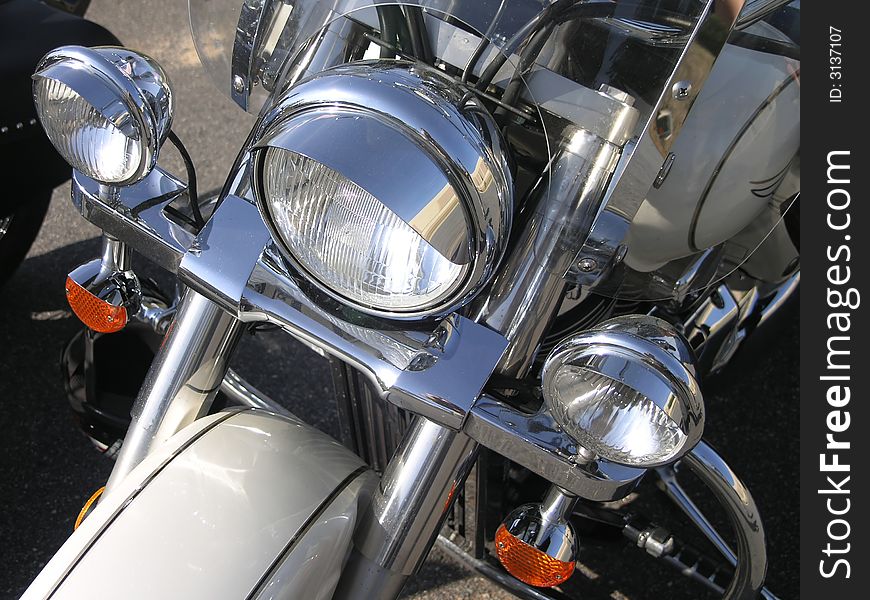 Close up of chrome motor cycle and parts. Close up of chrome motor cycle and parts