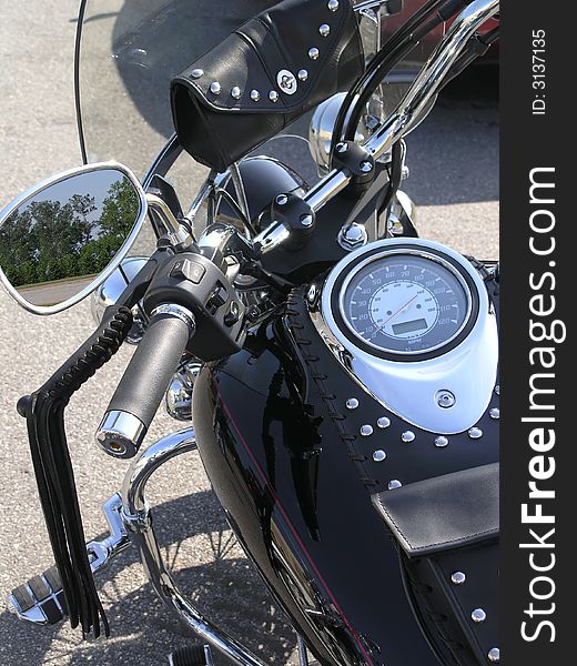 Close up of chrome motor cycle and parts. Close up of chrome motor cycle and parts