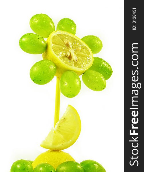Creative food: fruits flower abstract compositon on white background. Creative food: fruits flower abstract compositon on white background