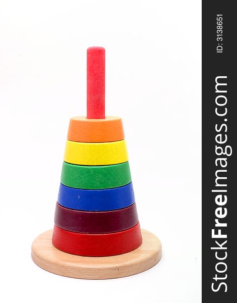 A tower of colorful discs on white. A tower of colorful discs on white