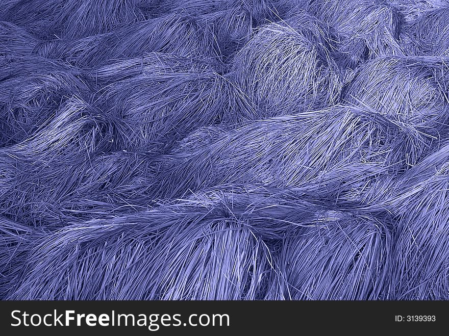 Photo of a laying dry grass in cold tones. Photo of a laying dry grass in cold tones