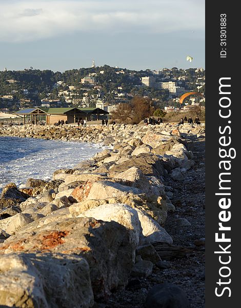 Beach along a rocky coastline. France, mediterranean coast. Beach along a rocky coastline. France, mediterranean coast.