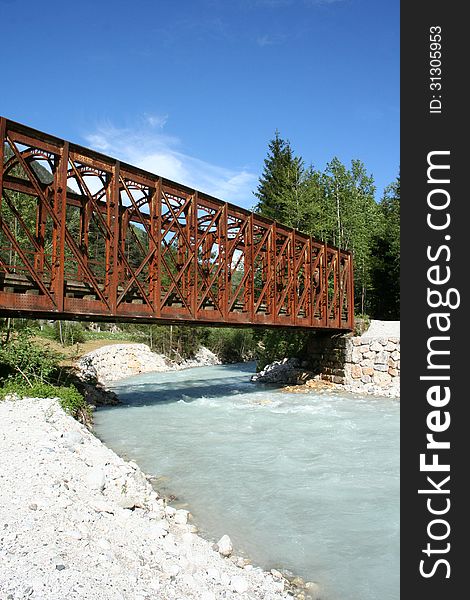 Old metal bridge on Sava river in Slovenia