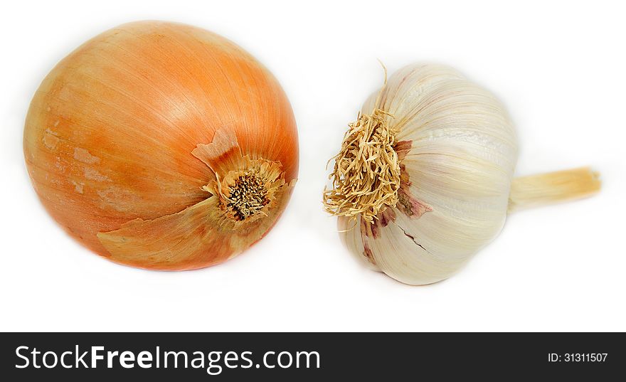 Onion and garlic on white background. Onion and garlic on white background