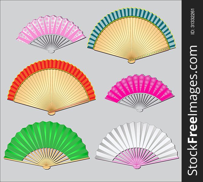 Items for women. colored fans on a gray background.