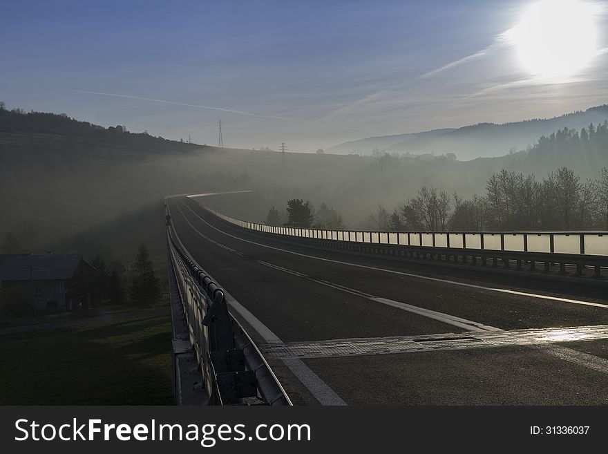 Bridge In The Mountains During Sunrise