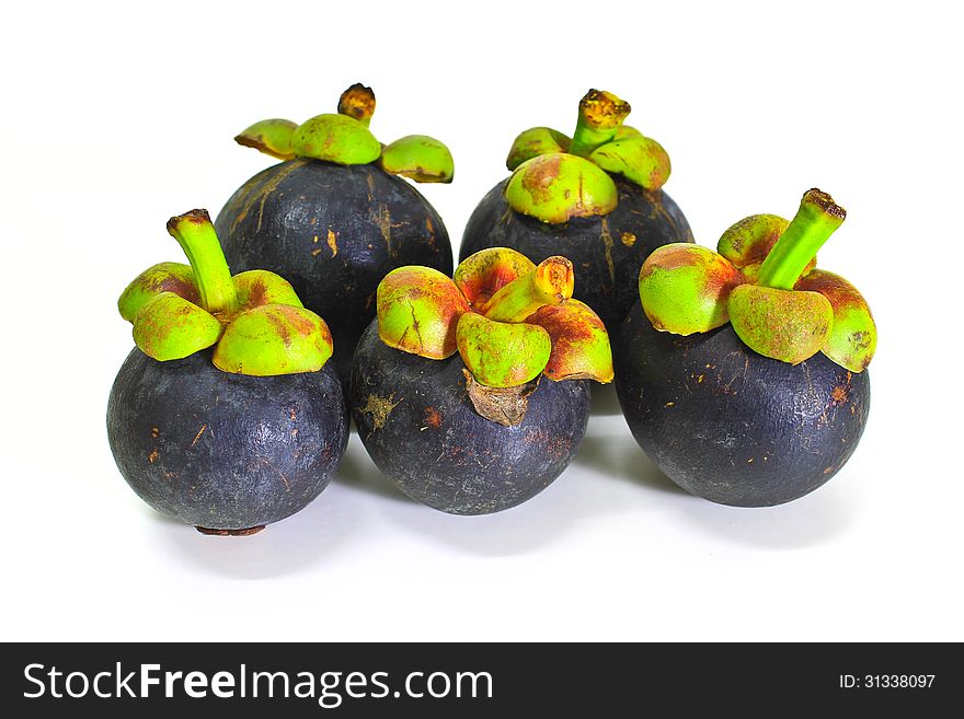 Tropical mangosteen fruit on white background