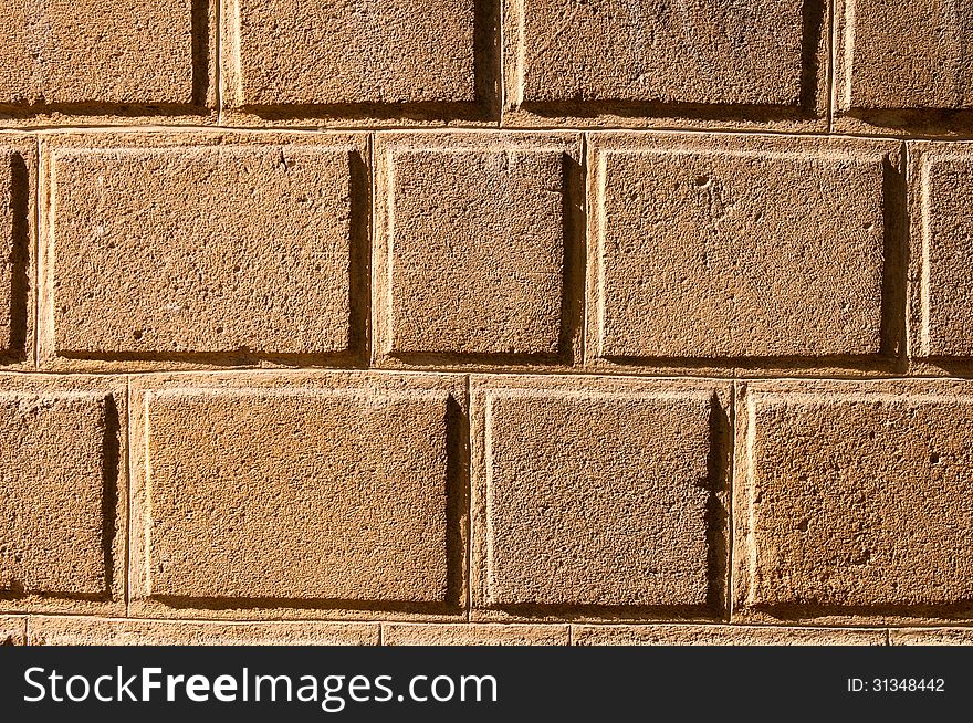 Yellow brick wall pattern background.