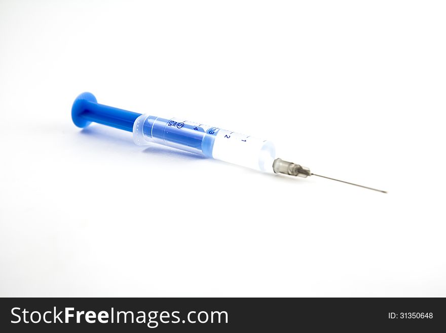 Syringe On White