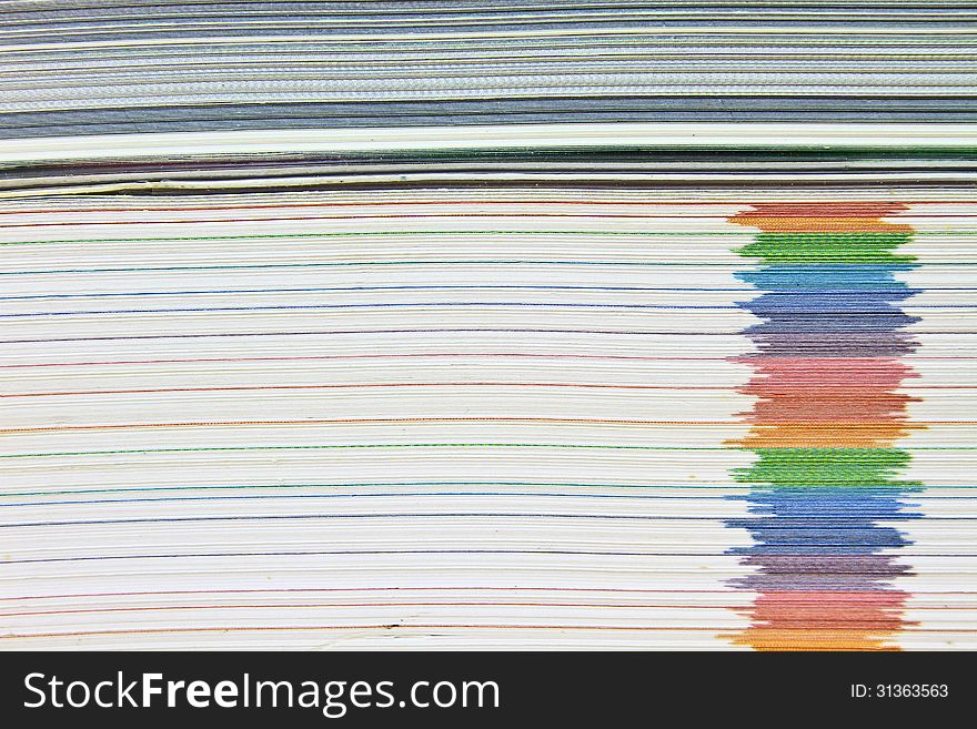 Pile of books on desk