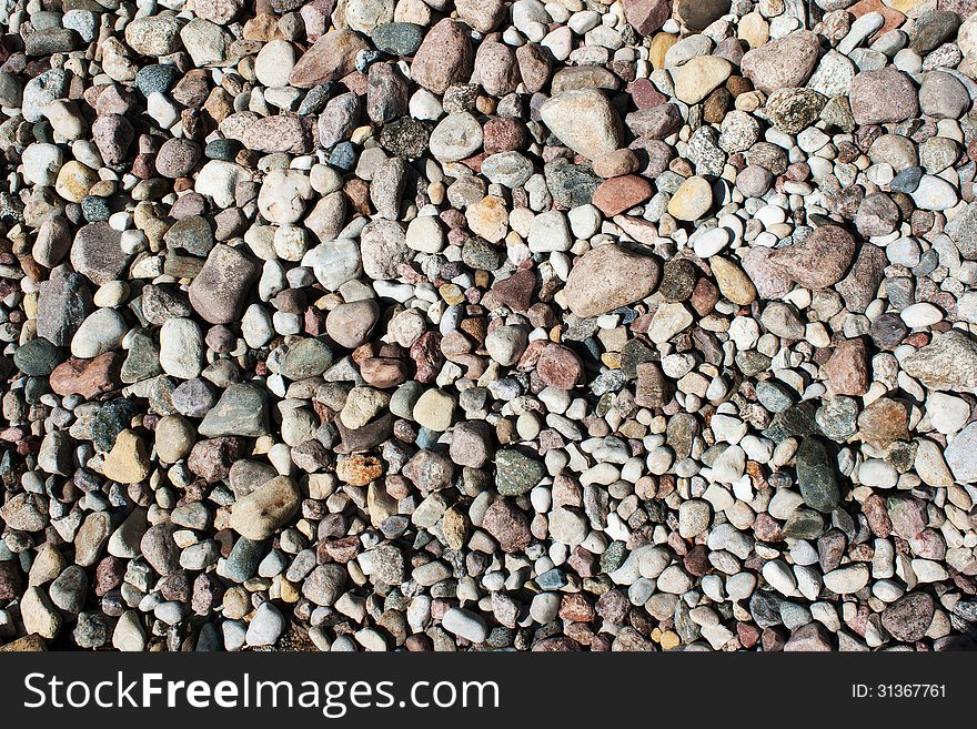 Many small stones as a texture and background