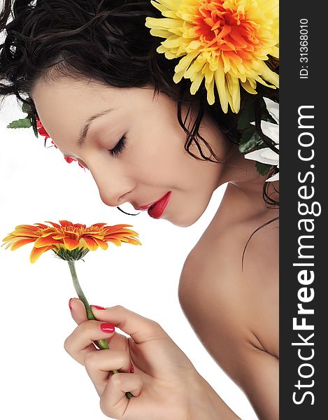 Photography of woman who smells flower with closed eyes in studio on white background. Photography of woman who smells flower with closed eyes in studio on white background