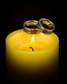 Wedding Rings On A Candle Stock Photos Wedding Rings On A Candle Stock Photos