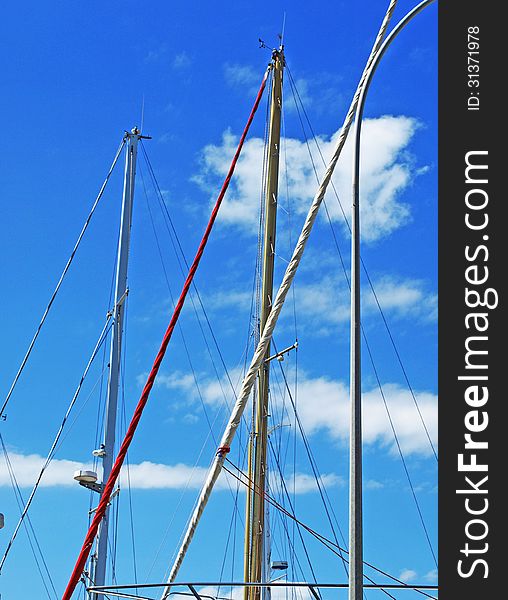 Yacht masts with sky backgound