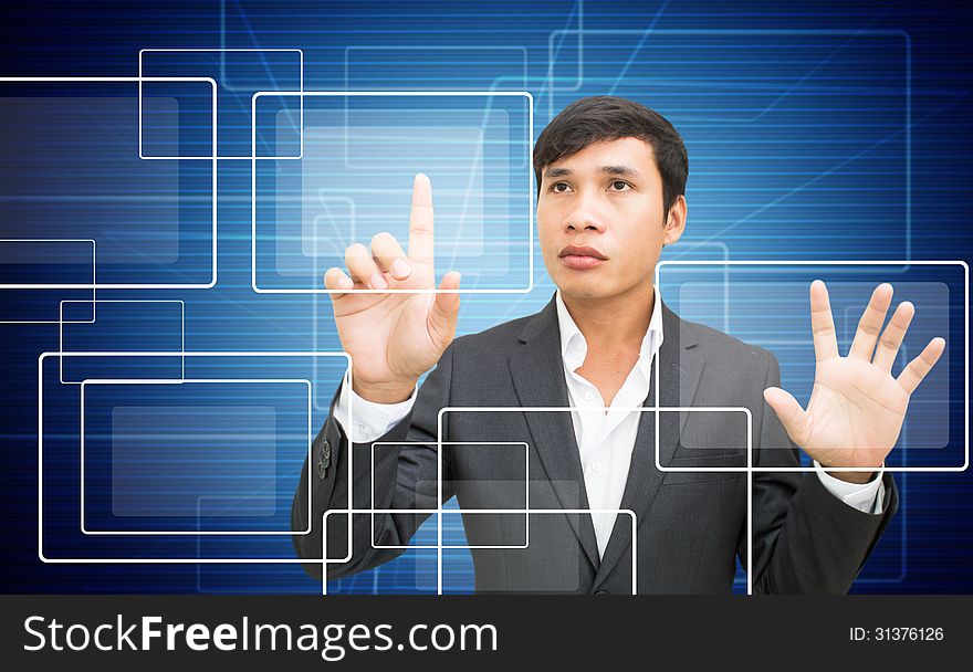 Asian Businessman With Touchscreen Interface