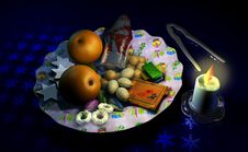 Decorated Christmas Dish With Fruit And Sweets, Beside A Candle Stock Photo Decorated Christmas Dish With Fruit And Sweets, Beside A Candle Stock Photo