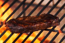 Beef Steak On Grill Royalty Free Stock Photography