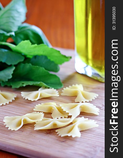 Bowtie pasta with greens and olive oil. Bowtie pasta with greens and olive oil.