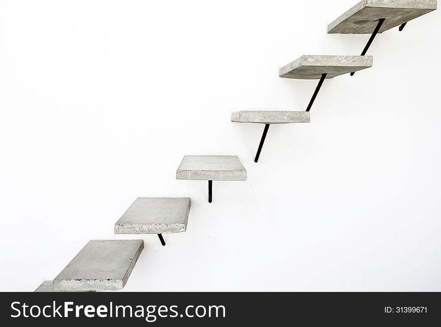 Concrete ladder on white wall background. Concrete ladder on white wall background