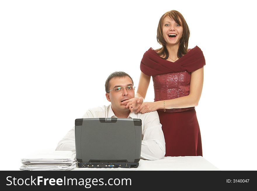 Young man and the woman in beautiful clothes embrace isolated on a white background. Young man and the woman in beautiful clothes embrace isolated on a white background