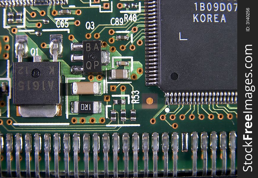 Surface mount chips and components near an edge connector on a circuit board. Surface mount chips and components near an edge connector on a circuit board.