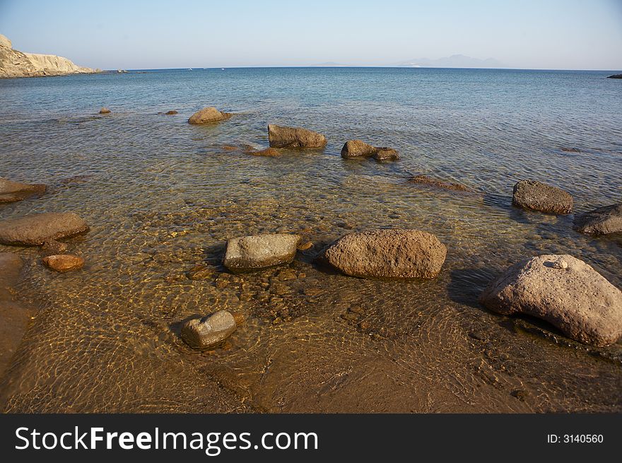 A beach of stones in greece. A beach of stones in greece