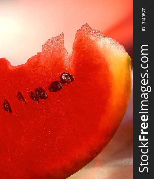 Ripe water-melon on a red background