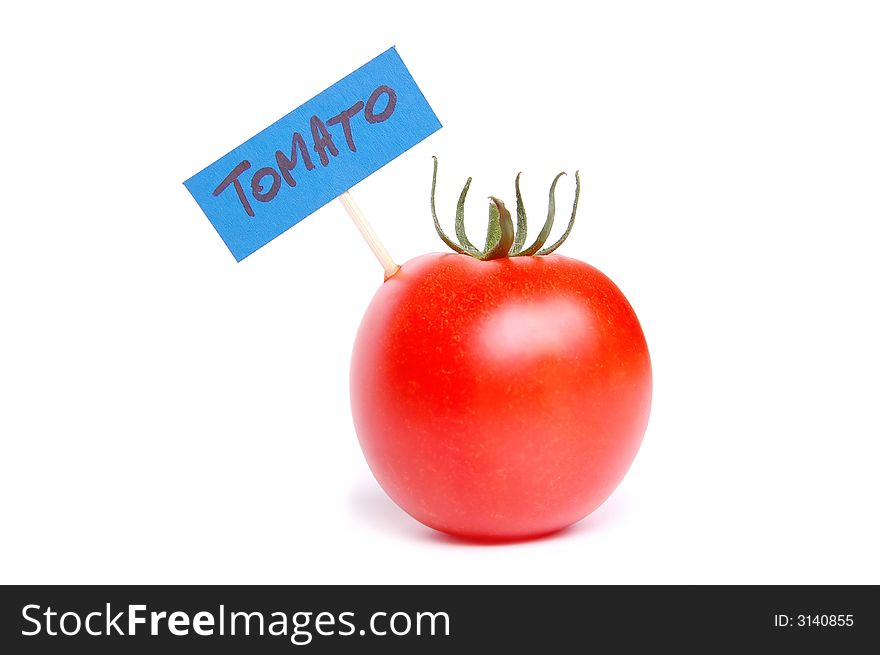 Red tomato with inscription isolated